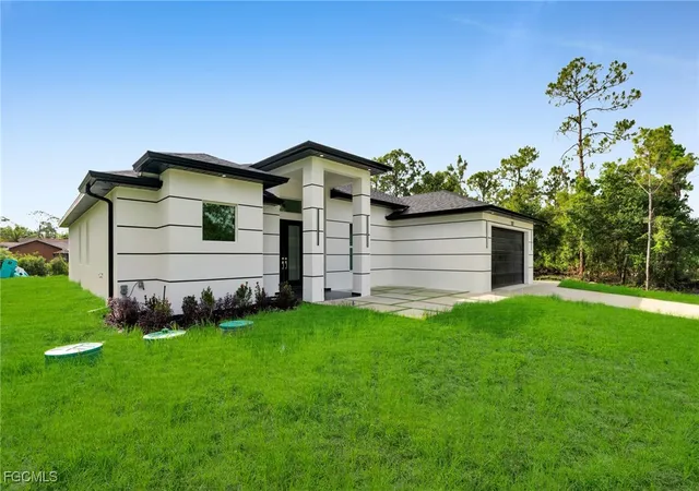 3rd image of 1021 Moore Ave, Lehigh Acres, FL 33972 | MLS# 2025016881