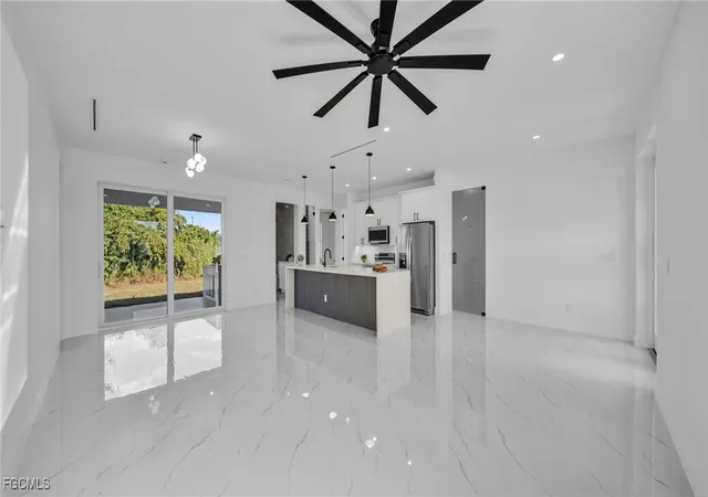 5th image of 2506 30Th St Sw, Lehigh Acres, FL 33976 | MLS# 2025018799