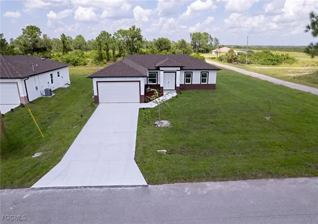Photo 1 of Single family home for sale at 1251 Bari St E, Lehigh Acres, FL 33974 | MLS# 2025019328 | Listing updated on 2025-11-13