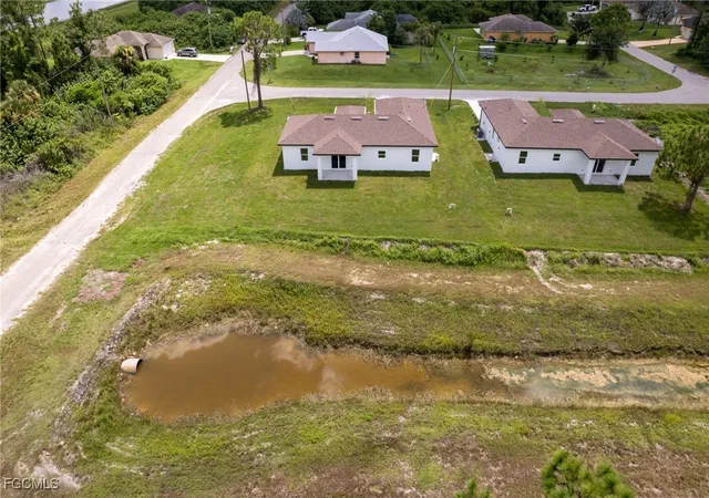 Photo 3 of Single family home for sale at 1251 Bari St E, Lehigh Acres, FL 33974 | MLS# 2025019328 | Listing updated on 2025-11-13