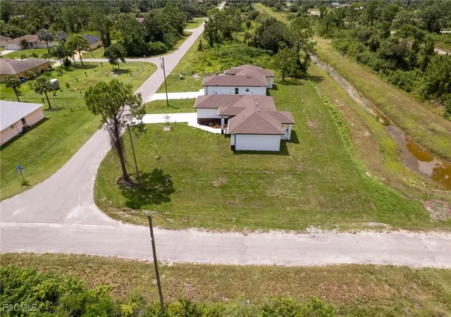 Photo 3 of Single family home for sale at 1251 Bari St E, Lehigh Acres, FL 33974 | MLS# 2025019328 | Listing updated on 2025-11-13