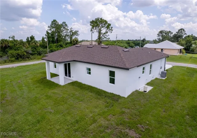 Photo 4 of Single family home for sale at 1251 Bari St E, Lehigh Acres, FL 33974 | MLS# 2025019328 | Listing updated on 2025-11-13