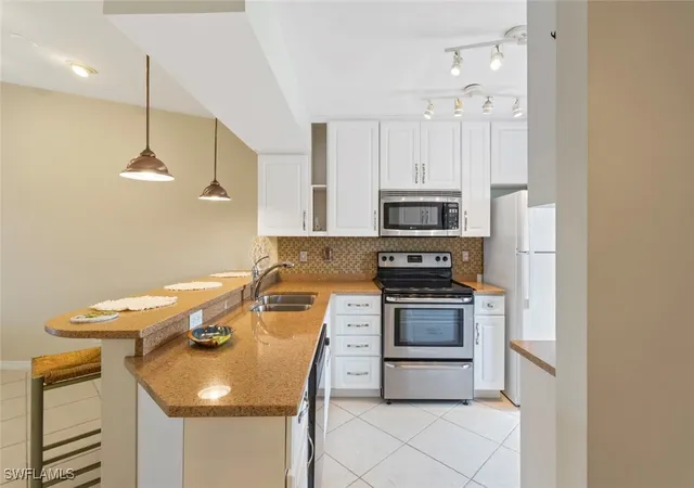 2nd image of 1305 Mainsail Dr #1013, Naples, FL 34114 | MLS# 225078894
