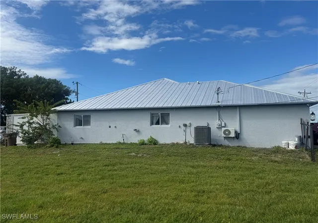 Photo 2 of Single family home for sale at 1818 Embers Pkwy W, Cape Coral, FL 33993 | MLS# 225078758 | Listing updated on 2025-11-09