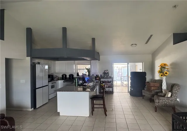 Photo 3 of Single family home for sale at 1818 Embers Pkwy W, Cape Coral, FL 33993 | MLS# 225078758 | Listing updated on 2025-11-09