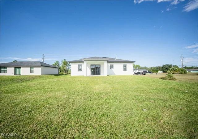 26th image of 2621 42nd St W, Lehigh Acres, FL 33971 | MLS# 2025019612