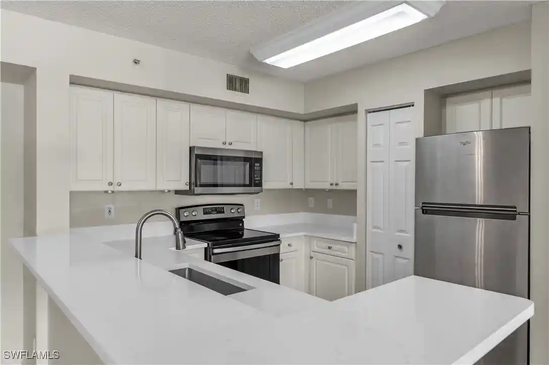 Condo for sale at 1230 Wildwood Lakes Blvd #105, Naples, FL 34104 | MLS# 225076654