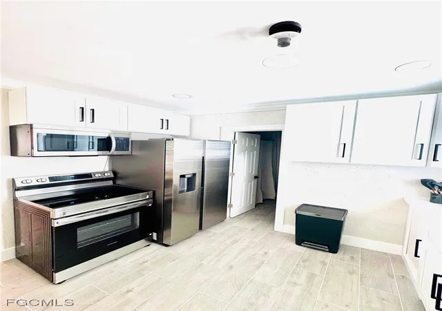 5th image of 127-129 Fairweather Ln, Fort Myers Beach, FL 33931 | MLS# 2025020610