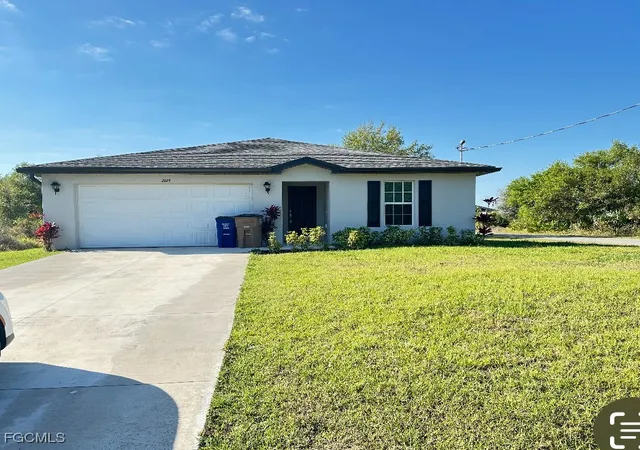 1st image of 2619 66th St W, Lehigh Acres, FL 33971 | MLS# 2025021867