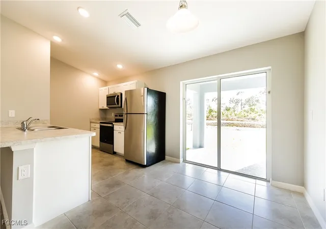 Photo 3 of Sale Pending at 858 Carbon St E, Lehigh Acres, FL 33974 | MLS# 2025021928 | Listing updated on 2026-07-14