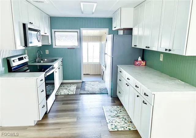 Photo 3 of Manufactured home for sale at 301 Dillard Ave, Fort Myers, FL 33908 | MLS# 2025022192 | Listing updated on 2026-04-27