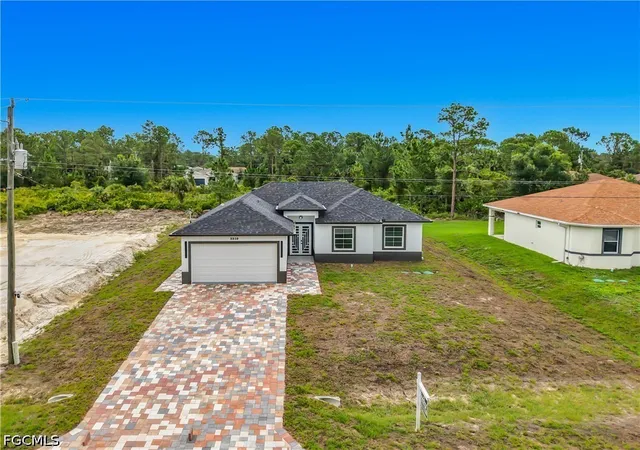 1st image of 3310 61st St W, Lehigh Acres, FL 33971 | MLS# 2025022355