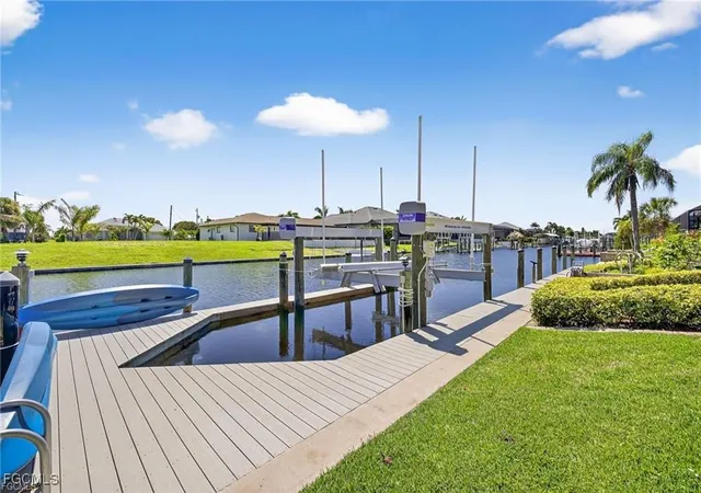 Photo 1 of Sale Pending at 4909 Sw 8th Court, Cape Coral, FL 33914 | MLS# 2025022443 | Listing updated on 2026-01-10