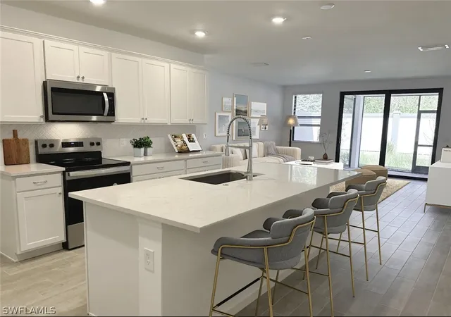 Photo 1 of Townhouse for sale at 27831 Solis Grande Dr, Bonita Springs, FL 34135 | MLS# 225081290 | Listing updated on 2026-03-16
