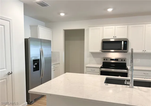 Photo 3 of Townhouse for sale at 27831 Solis Grande Dr, Bonita Springs, FL 34135 | MLS# 225081290 | Listing updated on 2026-03-16