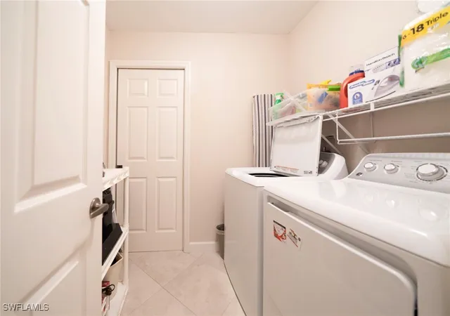 2nd image of 440 Wiggins Lake Ct, Naples, FL 34110
