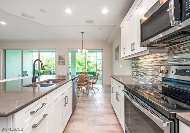 Listing Photo 4 - Condo for sale in building located at 6981 Avalon Cir, Naples, FL 34112 - Unit #1203