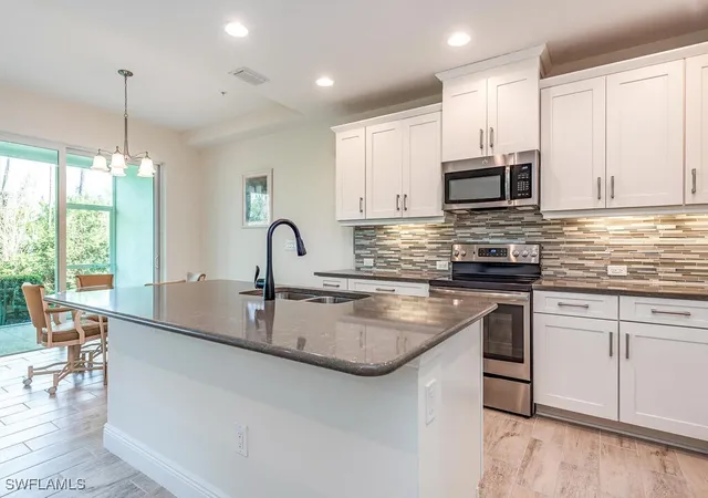 Listing Photo 5 - Condo for sale in building located at 6981 Avalon Cir, Naples, FL 34112 - Unit #1203