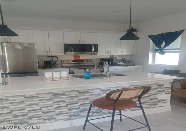 4th image of 163 Beckley Dr, Lehigh Acres, FL 33974 | MLS# 225082456
