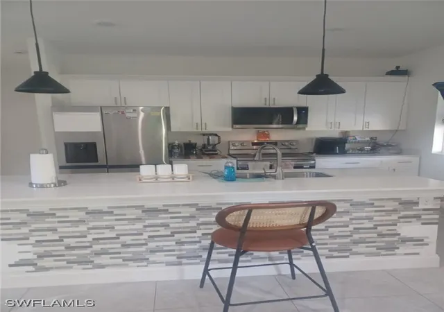 5th image of 163 Beckley Dr, Lehigh Acres, FL 33974 | MLS# 225082456