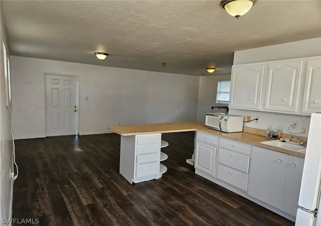 11th image of 315 Pettit Dr, Naples, FL 34140 | MLS# 225082594