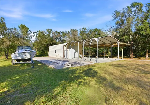 4th image of 19550 Nalle Rd, North Fort Myers, FL 33917 | MLS# 2025024382