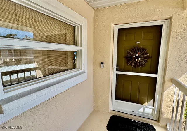 1st image of 645 Squire Ct #202, Naples, FL 34104 | MLS# 225079855