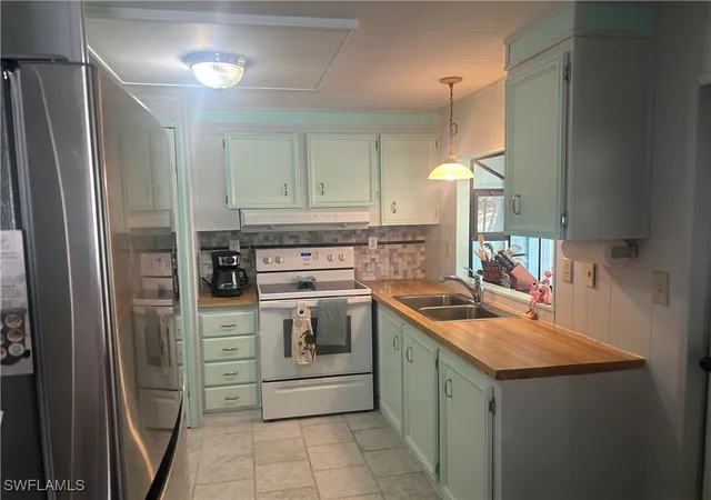 Photo 1 of Manufactured home for sale at 221 Indian Key Ln #254, Naples, FL 34114 | MLS# 225083759 | Listing updated on 2025-12-17