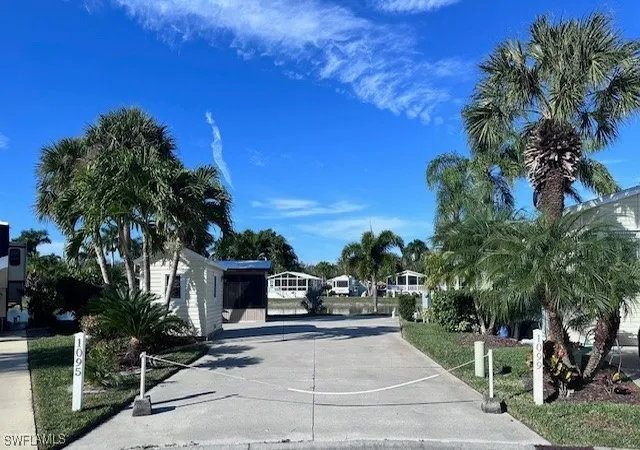 1st image of 1099 Opal Lake Pt, Naples, FL 34114 | MLS# 225084297