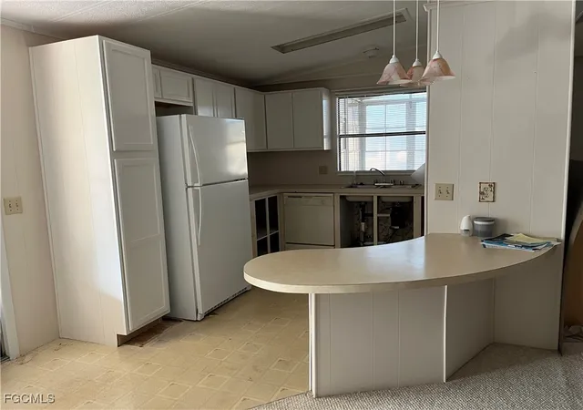 Photo 2 of Manufactured home for sale at 65 Sunset Cir, North Fort Myers, FL 33903 | MLS# 2025025765 | Listing updated on 2026-06-29