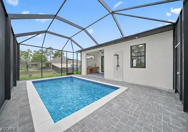 1st image of 910 Plumosa Ave, Lehigh Acres, FL 33972 | MLS# 2025025842