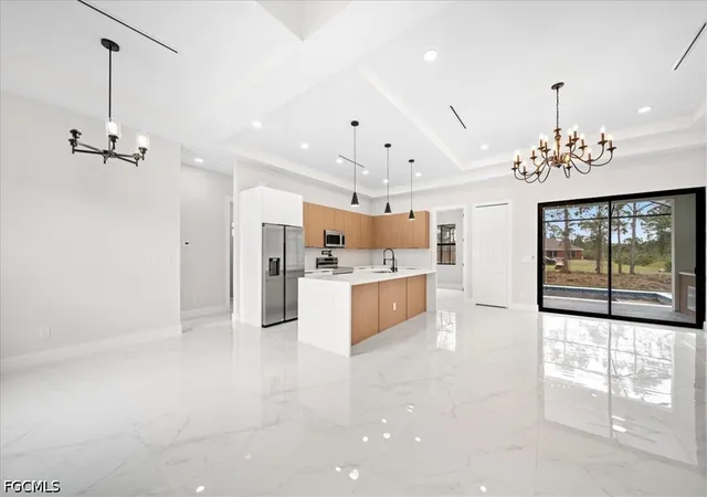 4th image of 910 Plumosa Ave, Lehigh Acres, FL 33972 | MLS# 2025025842