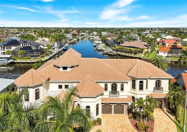 Photo 1 of Mansion for sale at 1433 Sw 57th Terrace, Cape Coral, FL 33914 | MLS# 2026000035 | Listing updated on 2026-07-08