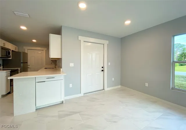 Photo 3 of Multi family home for sale at 2401 2403 Joe Ave S, Lehigh Acres, FL 33973 | MLS# 2026000711 | Listing updated on 2026-02-02