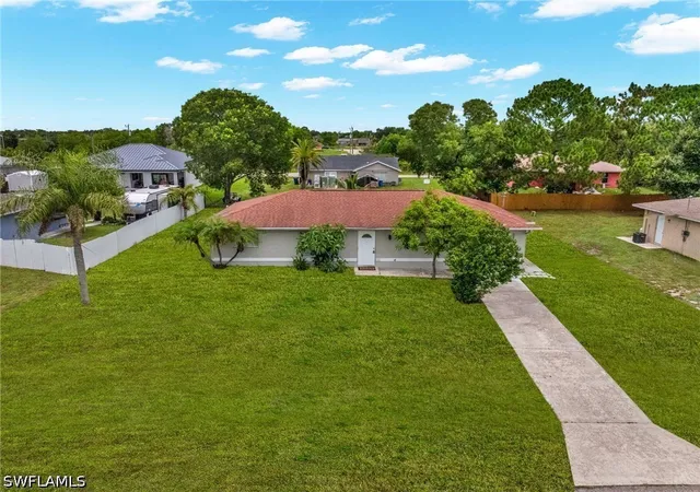 1st image of 909 Sally Ave N, Lehigh Acres, FL 33971 | MLS# 226000767