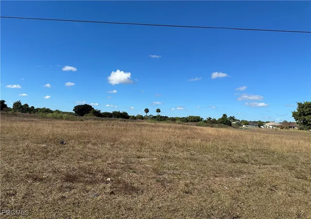 Photo 1 of Land for sale at 688 Bell Blvd S, Lehigh Acres, FL 33974 | MLS# 2026001289 | Listing updated on 2026-01-23