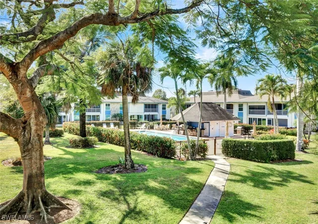 2nd image of 325 Charlemagne Blvd, Naples, FL 34112