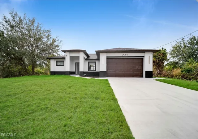 Photo 3 of Single family home for sale at 1002 Kanuga St E, Lehigh Acres, FL 33974 | MLS# 2026002553 | Listing updated on 2026-04-13