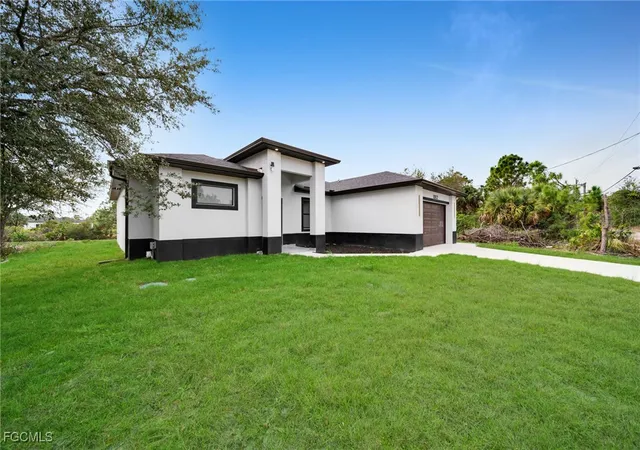 Photo 4 of Single family home for sale at 1002 Kanuga St E, Lehigh Acres, FL 33974 | MLS# 2026002553 | Listing updated on 2026-04-13