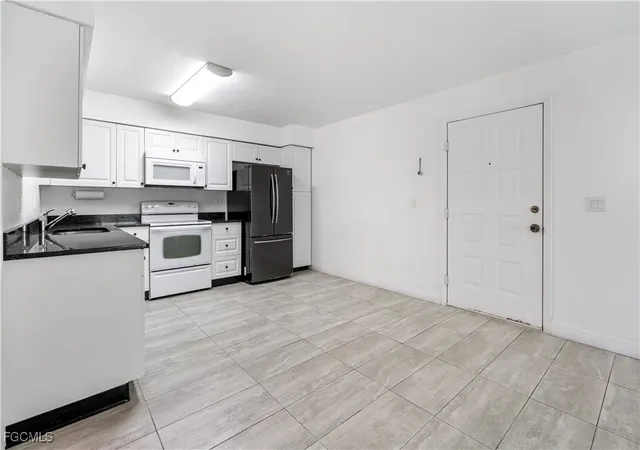 4th image of 1100 Pondella Rd #908, Cape Coral, FL 33909 | MLS# 2026002600