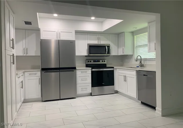 Photo 3 of Single family home for sale at 310 Carnaby Ct, Naples, FL 34112 | MLS# 225079026 | Listing updated on 2026-04-11