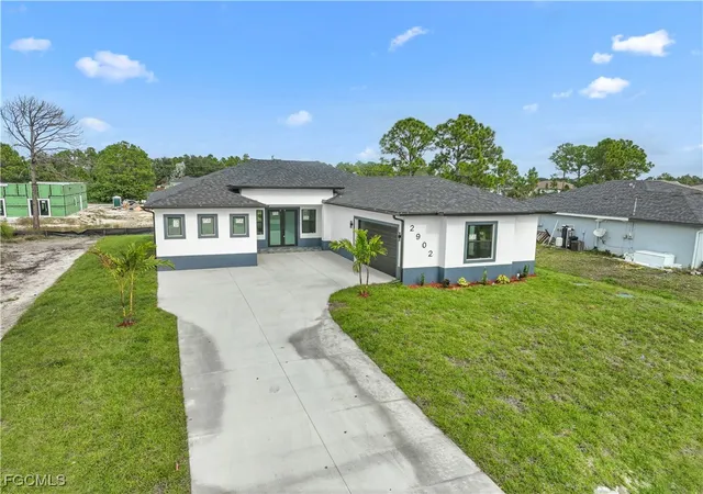2nd image of 2902 42nd St W, Lehigh Acres, FL 33971 | MLS# 2026003659