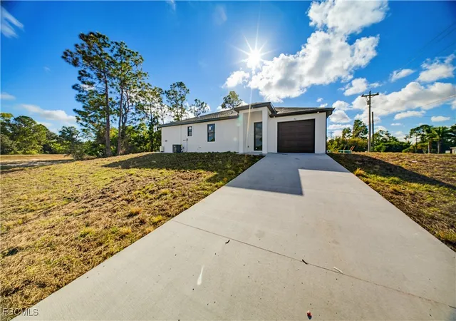 1st image of 701-703 Homestead Rd S, Lehigh Acres, FL 33974 | MLS# 2026003848