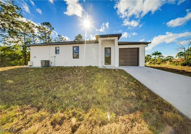 2nd image of 701-703 Homestead Rd S, Lehigh Acres, FL 33974 | MLS# 2026003848