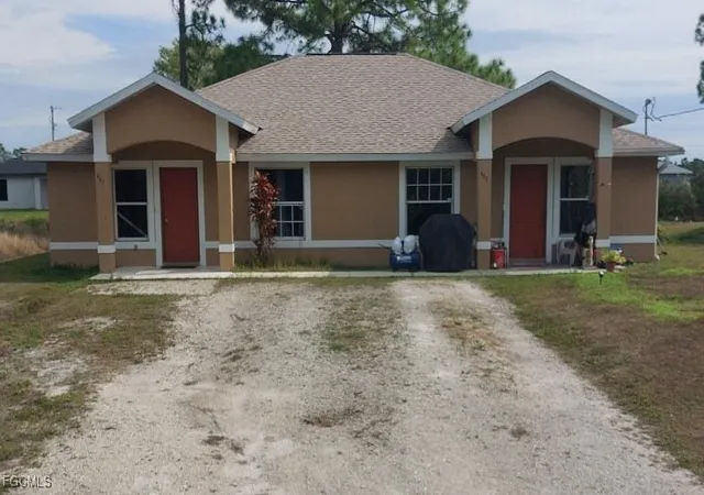 Photo 1 of Multi family home for sale at 461/463 Loretta Ave S, Lehigh Acres, FL 33974 | MLS# 2026004114 | Listing updated on 2026-08-01