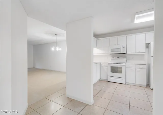 Listing Photo 4 - Condo for sale in building located at 7761 Jewel Ln, Naples, FL 34109 - Unit #103