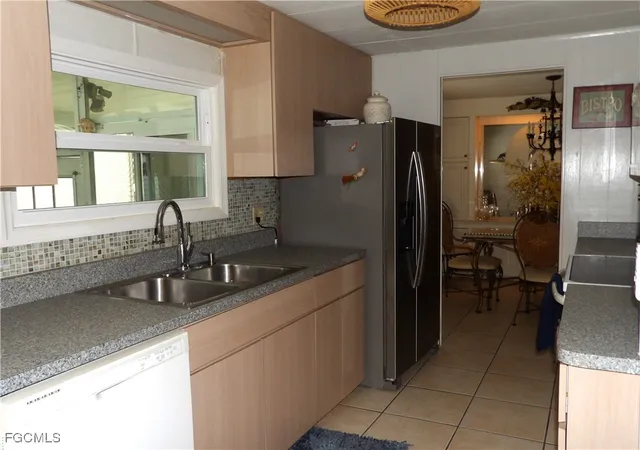 Photo 3 of Manufactured home for sale at 838 Hollyberry Ct, North Fort Myers, FL 33917 | MLS# 2026004429 | Listing updated on 2026-07-25