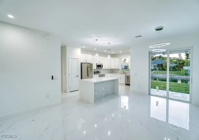 Photo 3 of Single family home for sale at 34 SE 23rd Place, Cape Coral, FL 33990 | MLS# 2026004845 | Listing updated on 2026-08-28