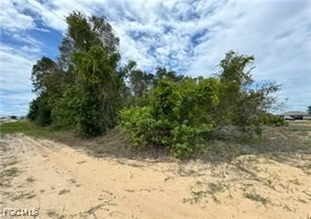 Photo 1 of Land for sale at 85 Milwaukee Blvd, Lehigh Acres, FL 33974 | MLS# 2026004962 | Listing updated on 2026-06-29