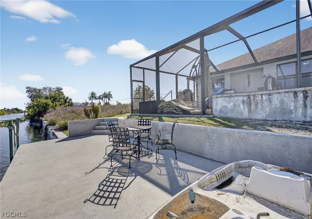 2nd image of 309 Nw 5th Ter, Cape Coral, FL 33993 | MLS# 2026005038